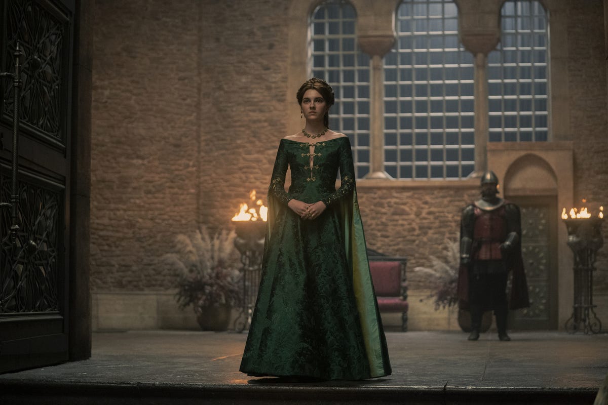 Queen Alicent in a green gown, with serious business on her mind